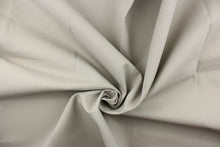 Load image into Gallery viewer, Twill fabric in a solid light gray with brownish undertones .
