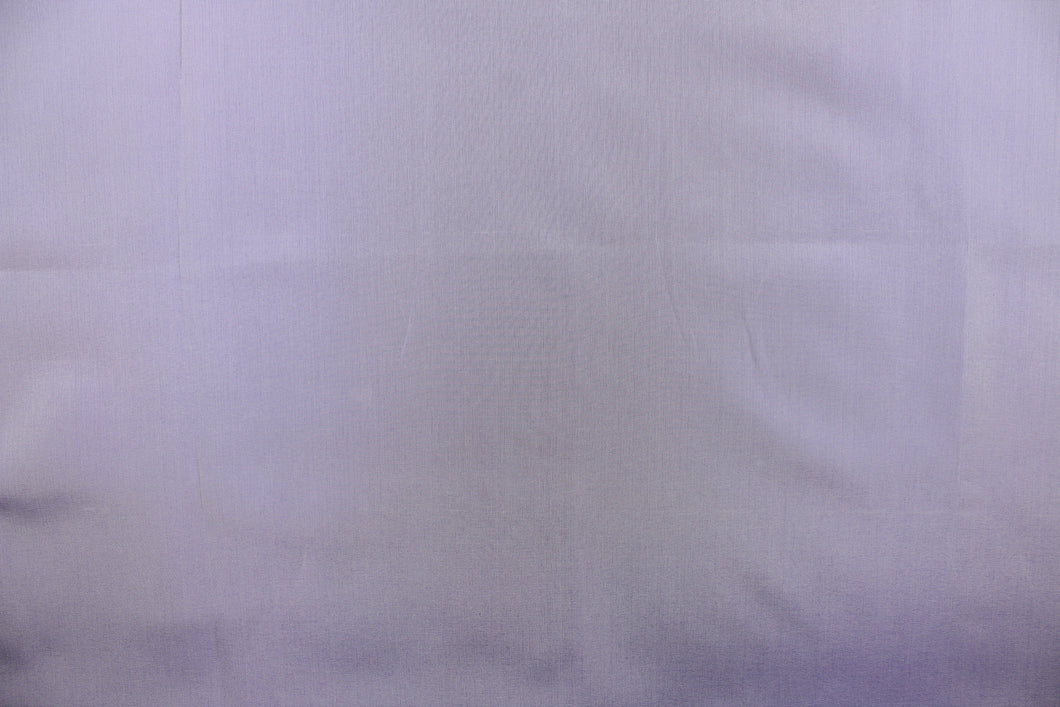 Taffeta fabric in iridescent light purple with gray undertones. 
