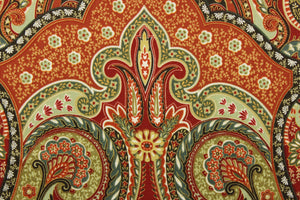 This fabric features a damask paisley design in orange, red, brown, white, blue green, and gold. 