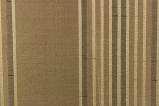 This fabric features a vertical striped design in gold and pale black on a beige background