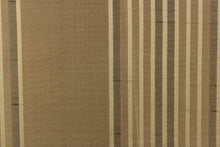 Load image into Gallery viewer, This fabric features a vertical striped design in gold and pale black on a beige background
