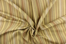 Load image into Gallery viewer, This rich woven yarn dyed fabric features a vertical bold multi width striped pattern in brown, gray, beige, and cream. 

