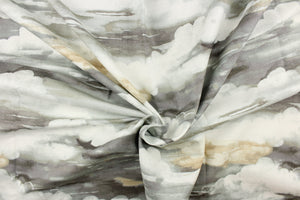 This fabric features a cloud design in shades of gray, beige and white.