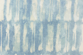 This fabric features an abstract design in shades of light blues and white. 