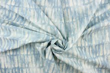 Load image into Gallery viewer, This fabric features an abstract design in shades of light blues and white. 
