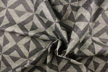 Load image into Gallery viewer, This vinyl fabric features a x design in varies shades of gray. 
