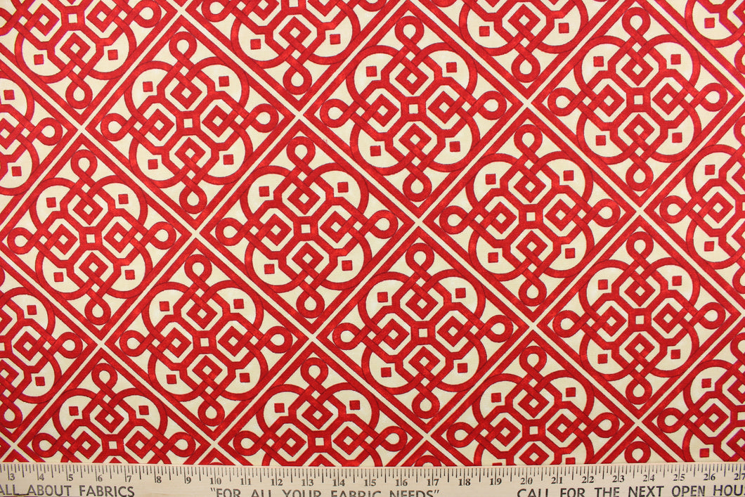 This screen printed fabric features a charming lattice print design in red against an off white cotton club print cloth. 