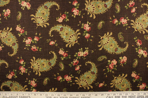 This fabric features a paisley and floral design on a chocolate brown background.  Colors include brown, red, pink, green and gold.