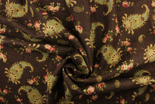 Load image into Gallery viewer, This fabric features a paisley and floral design on a chocolate brown background. Colors include brown, red, pink, green and gold.
