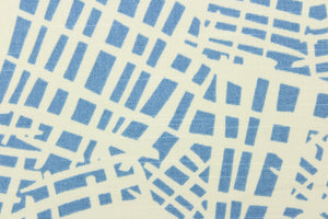 This screen printed fabric features a unique design in sky blue and off white. 