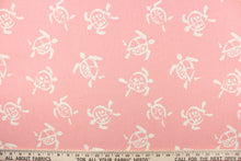Load image into Gallery viewer, This fun fabric features cream colored turtles on a pink background.
