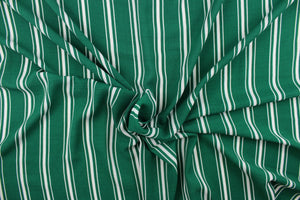 This georgette fabric features a stripe design in white and emerald green.