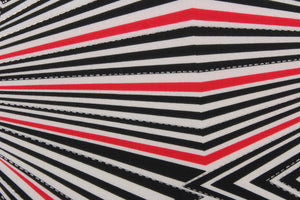 This 8 way stretch lycra fabric features a stripe design in black, red, silver and white.
