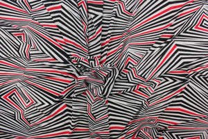 This 8 way stretch lycra fabric features a stripe design in black, red, silver and white.
