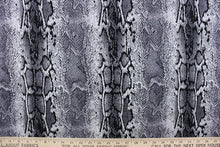 Load image into Gallery viewer,  This 8 way stretch lycra fabric features a snakeskin design in black, gray and white
