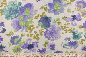  This knit fabric features a floral design in a sparkly  gold. turquoise, purple, and green. 