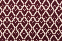 Load image into Gallery viewer, This 2way stretch lycra fabric features a geometric  design of diamonds in burgundy  and off white.
