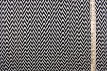 Load image into Gallery viewer, This 8 way stretch lycra fabric features a chevron design in black and white.

