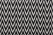 Load image into Gallery viewer, This 8 way stretch lycra fabric features a chevron design in black and white.
