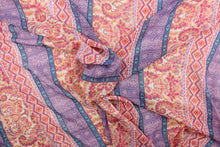 Load image into Gallery viewer, This chiffon fabric features a paisley design in orange, purple, pink, white, turquoise, and gray. 
