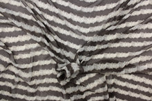 Load image into Gallery viewer, This chiffon fabric features a stripe design in  a taupe and gray. 
