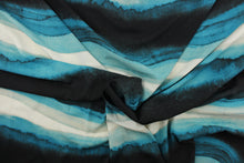Load image into Gallery viewer, This chiffon fabric features a Ombre design in teal green, deep teal, turquoise, black, white, and gray. 
