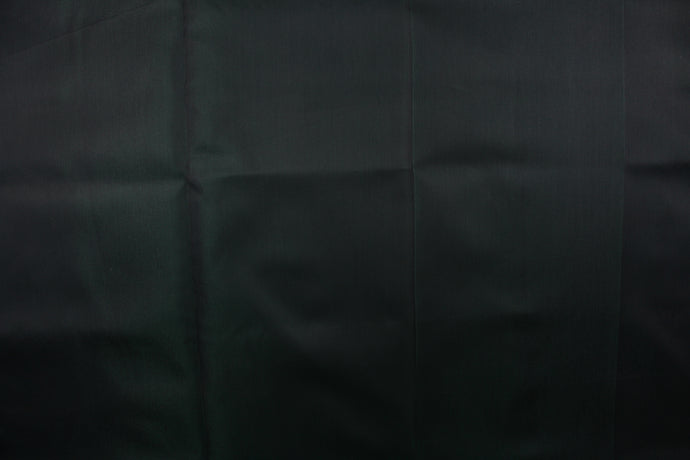  Taffeta fabric in iridescent dark green.