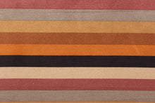 Load image into Gallery viewer, This suede lycra fabric features a stripe design in orange, nude, brown, tan, beige, dusty rose, and taupe . 
