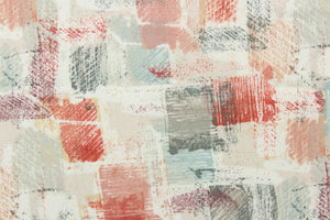 This fabric features an abstract design in coral, pink, gray, pale blue, pale nude, purple, and dull white.