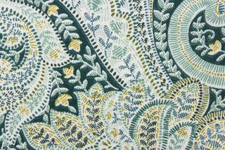 This fabric features a paisley design in green tones, white, olive, teal, golden tan, and blue green.