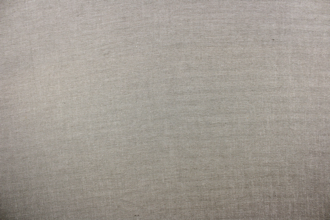 This wide jacquard has a twill design in a light tan.
