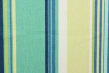 Load image into Gallery viewer, This outdoor fabric features a stripe design in blue, lime green, turquoise, white, and pale yellow
