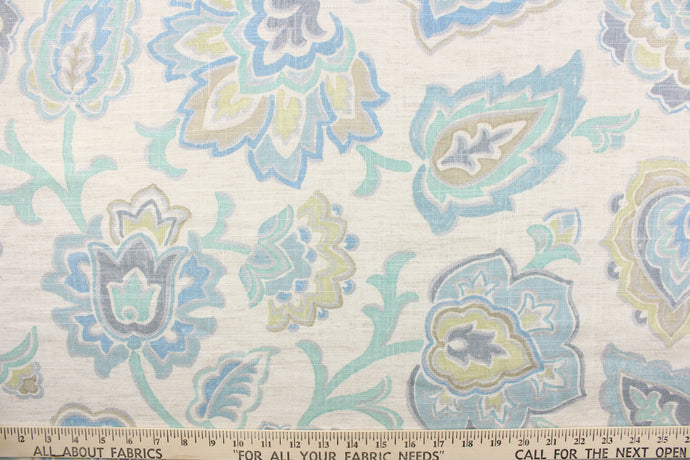 This linen blend fabric features a whimsical floral design in pale turquoise, pale green, silver, light tan, gray, and pale blue against a natural background.