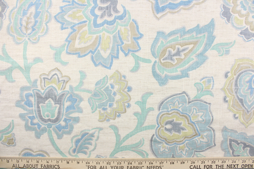 This linen blend fabric features a whimsical floral design in pale turquoise, pale green, silver, light tan, gray, and pale blue against a natural background.
