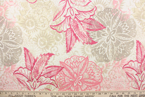 This fabric features a floral design in pink, white, light khaki, hot pink and beige.