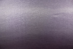 This taffeta fabric in iridescent in a gray purple.