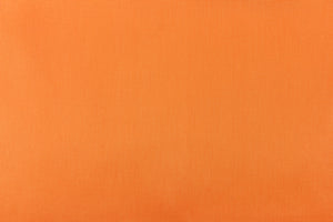 This taffeta fabric in solid bright orange