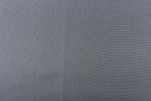 Load image into Gallery viewer, This taffeta fabric in solid in dark gray. 
