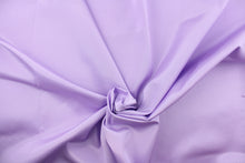 Load image into Gallery viewer, This bengaline faille fabric in a solid soft purple. This fabric has a slight shine and a slight ribs in the weft.
