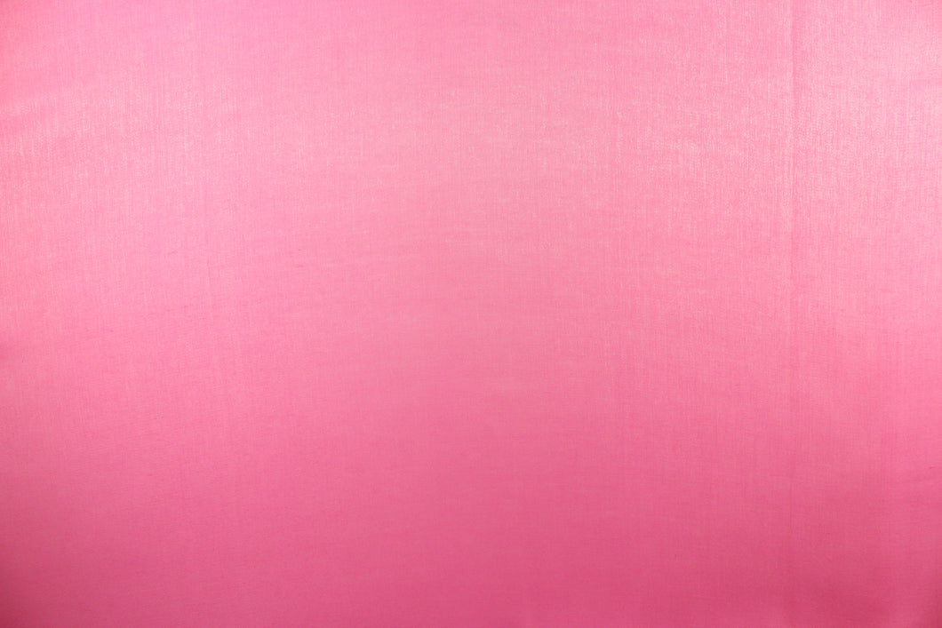 This taffeta fabric in iridescent in bright pink with hints of gold.