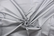 Load image into Gallery viewer, This taffeta fabric in solid silvery gray.
