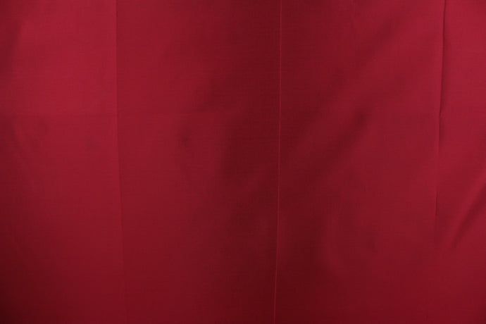 This taffeta fabric in iridescent in deep red.