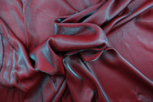Load image into Gallery viewer, This taffeta fabric in iridescent in red and turquoise.
