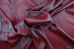 This taffeta fabric in iridescent in red and turquoise.