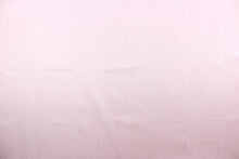 Load image into Gallery viewer, This taffeta fabric in a solid in soft pink. This fabric has a slight shine and a wavy, watery look.

