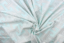 Load image into Gallery viewer, This fabric features a geometric design in gray, white and pale turquoise. 
