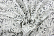 Load image into Gallery viewer, This fabric features a geometric design in varying gray tones and white

