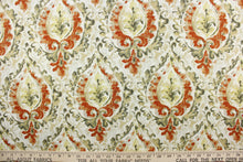 Load image into Gallery viewer,  This fabric features a damask design in green, orange, beige, pale yellow, gray, and white . 
