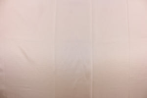 This taffeta fabric in solid light peachy pink .