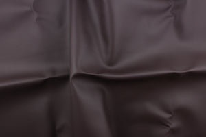 This vinyl features a smooth design in a dark brown tone.